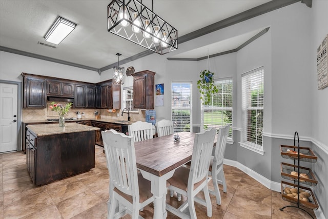 403 Gibraltar Ln, Lorena, TX 76655 - dining area with ornamental molding, baseboards, and light tile patterned floors