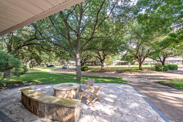 6533 Axton Cir, Dallas, TX 75214 - view of patio / terrace featuring an outdoor fire pit