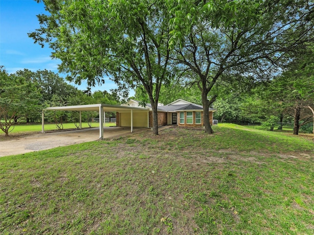 351 Oak Creek Dr, New Hope, TX 75071 - view of front facade featuring driveway, a carport, a front yard, and brick siding