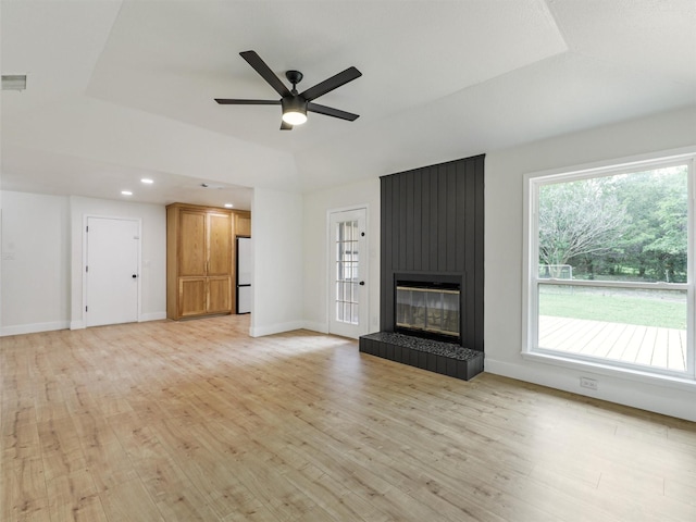 351 Oak Creek Dr, New Hope, TX 75071 - unfurnished living room with light wood-type flooring, ceiling fan, recessed lighting, baseboards, and a fireplace
