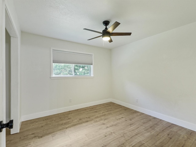 351 Oak Creek Dr, New Hope, TX 75071 - empty room featuring wood finished floors, baseboards, and a ceiling fan