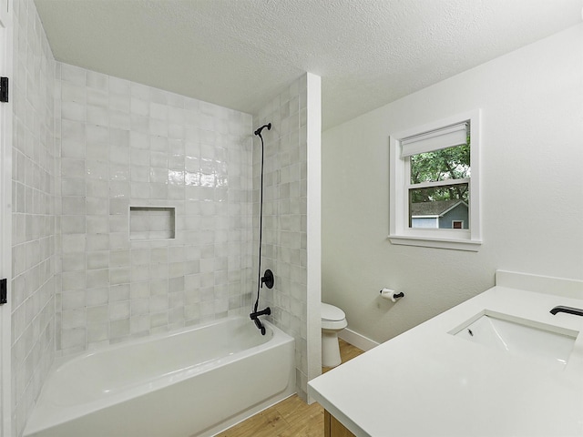 351 Oak Creek Dr, New Hope, TX 75071 - full bathroom with vanity, wood finished floors, shower / bathtub combination, toilet, and a textured ceiling