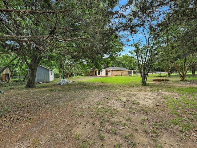 351 Oak Creek Dr, New Hope, TX 75071 - view of grassy yard featuring an outdoor structure