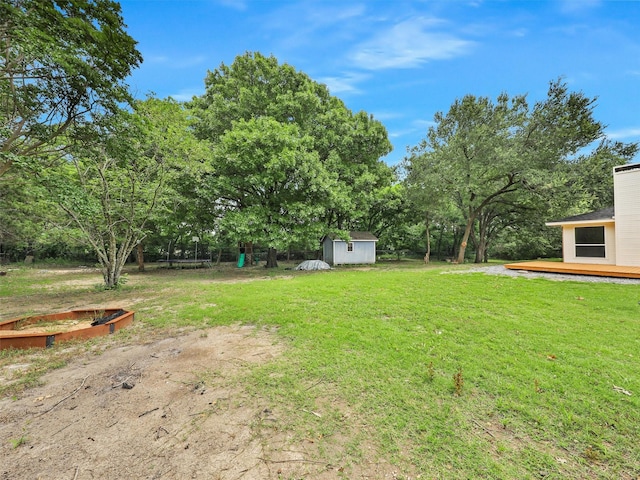 351 Oak Creek Dr, New Hope, TX 75071 - view of grassy yard with a wooden deck and view of scattered trees