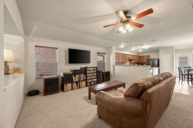 515 Angela Ln, Euless, TX 76039 - living area with light carpet, ceiling fan, and plenty of natural light