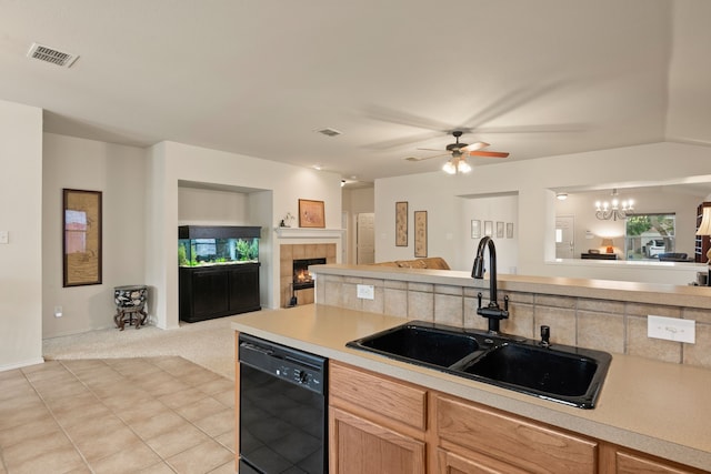 515 Angela Ln, Euless, TX 76039 - kitchen featuring black dishwasher, open floor plan, a sink, and light countertops