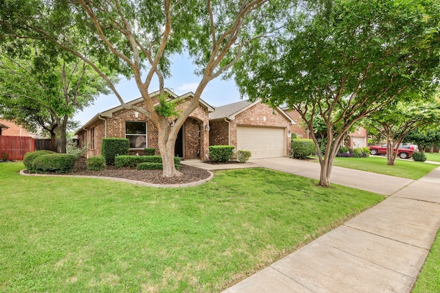 515 Angela Ln, Euless, TX 76039 - view of front of property with brick siding, concrete driveway, and a garage