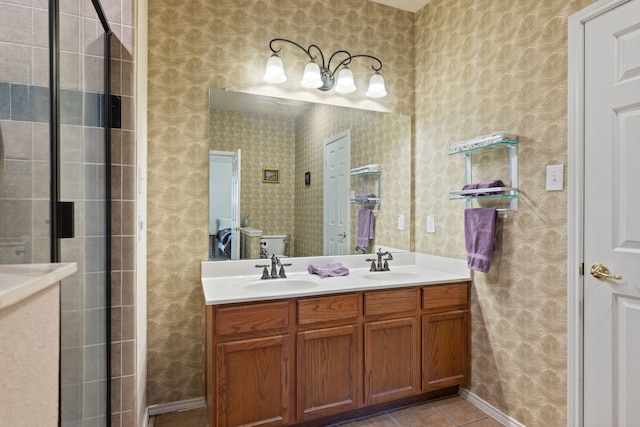 515 Angela Ln, Euless, TX 76039 - bathroom with tile patterned floors, double vanity, toilet, and a tile shower