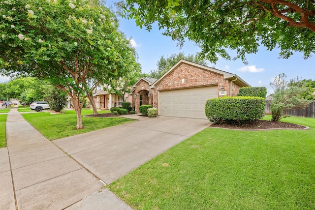 515 Angela Ln, Euless, TX 76039 - ranch-style home with brick siding, an attached garage, and concrete driveway