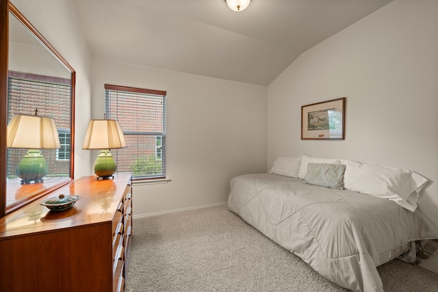 515 Angela Ln, Euless, TX 76039 - carpeted bedroom featuring vaulted ceiling and baseboards