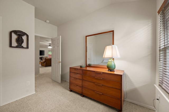 515 Angela Ln, Euless, TX 76039 - bedroom with light colored carpet, lofted ceiling, and baseboards