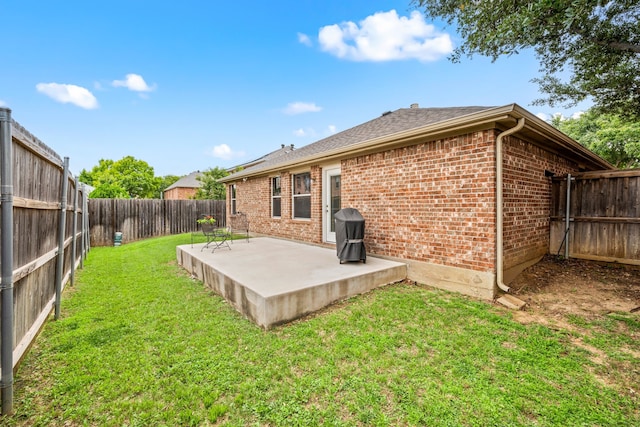 515 Angela Ln, Euless, TX 76039 - rear view of house with brick siding and a patio area