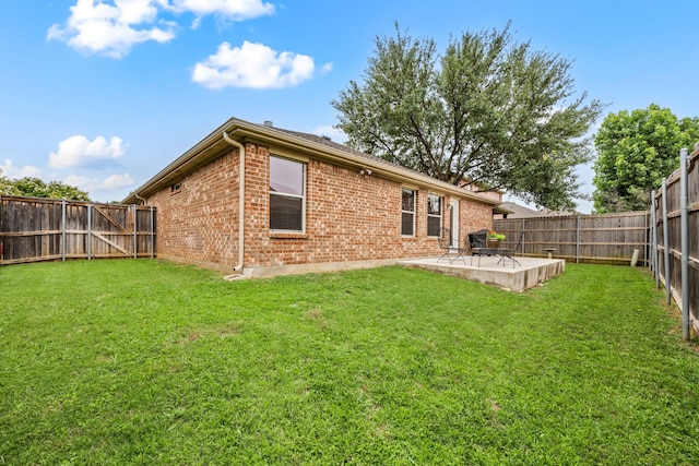 515 Angela Ln, Euless, TX 76039 - back of house with brick siding and a patio