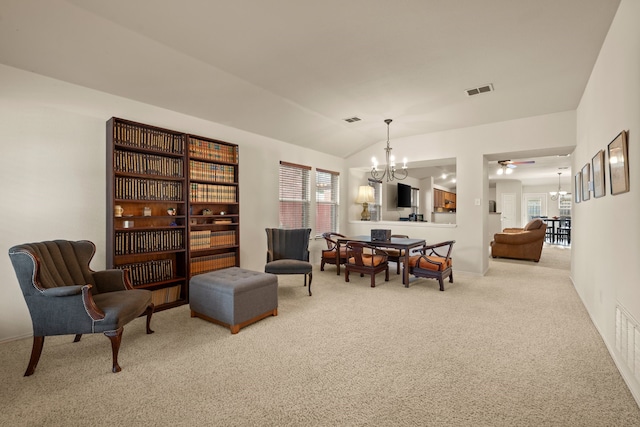 515 Angela Ln, Euless, TX 76039 - carpeted dining room featuring a chandelier, lofted ceiling, ceiling fan, and baseboards