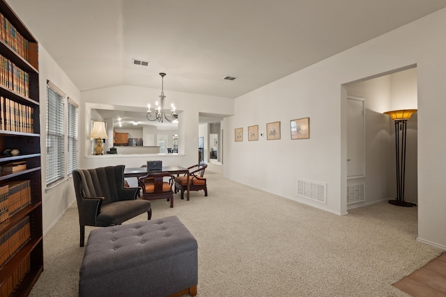 515 Angela Ln, Euless, TX 76039 - dining space featuring a chandelier, carpet floors, and lofted ceiling