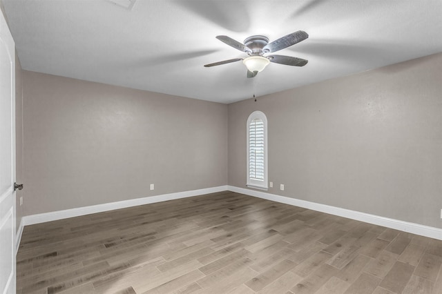 1904 Alston St, Arlington, TX 76013 - spare room featuring wood finished floors, a ceiling fan, and baseboards