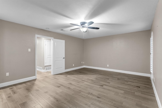 1904 Alston St, Arlington, TX 76013 - spare room featuring a ceiling fan, baseboards, and wood finished floors