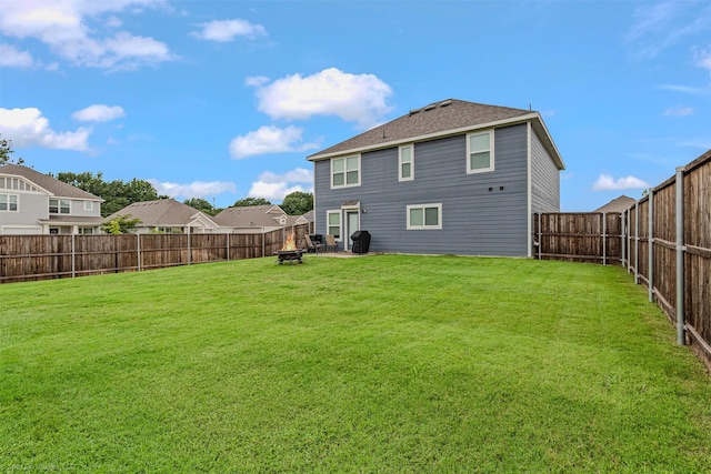 129 Clear Creek Ln, Terrell, TX 75160 - back of house featuring an outdoor fire pit