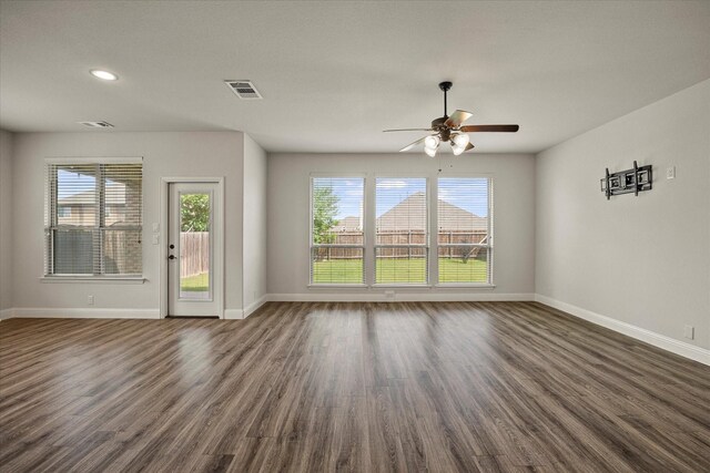 946 Mangrove Dr, Fate, TX 75087 - unfurnished living room featuring baseboards, ceiling fan, dark wood-style flooring, and recessed lighting