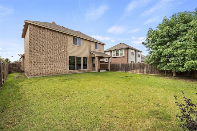 946 Mangrove Dr, Fate, TX 75087 - rear view of property with brick siding