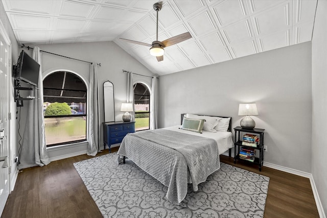 5556 Canada Ct, Rockwall, TX 75032 - bedroom with dark wood-style flooring, baseboards, lofted ceiling, and a ceiling fan