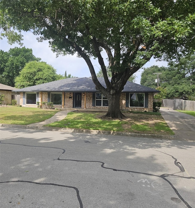 5012 Westhaven Dr, Fort Worth, TX 76132 - view of front of property featuring brick siding and driveway