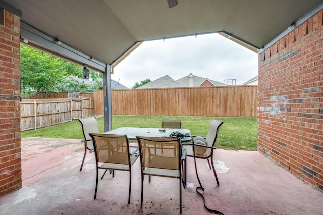 1004 Broken Spoke Dr, Little Elm, TX 75068 - fenced backyard with outdoor dining area and a patio