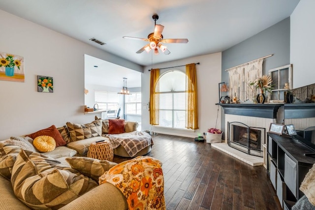 1004 Broken Spoke Dr, Little Elm, TX 75068 - living area featuring ceiling fan, a brick fireplace, and hardwood / wood-style flooring