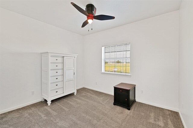 1650 Fm 36 S, Caddo Mills, TX 75135 - unfurnished bedroom featuring light colored carpet, baseboards, and ceiling fan