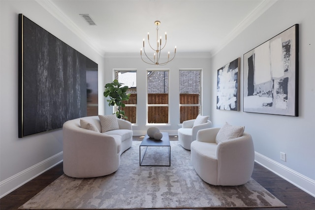3690 Guinn Gate Dr, Frisco, TX 75034 - living area with a chandelier, ornamental molding, baseboards, and wood finished floors