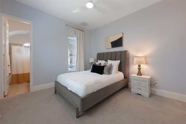 3690 Guinn Gate Dr, Frisco, TX 75034 - bedroom featuring light carpet, baseboards, a ceiling fan, and ensuite bath