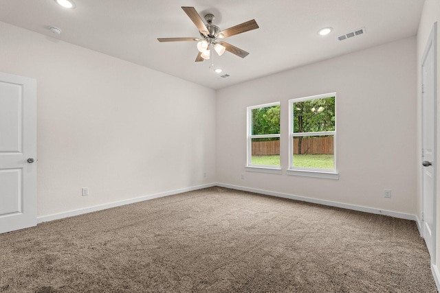 301 Kalura Way, Tool, TX 75143 - spare room featuring carpet flooring, a ceiling fan, recessed lighting, baseboards, and a smoke detector