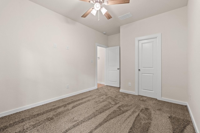 301 Kalura Way, Tool, TX 75143 - unfurnished bedroom with carpet flooring, baseboards, and a ceiling fan