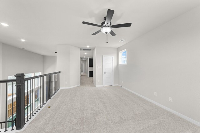 2013 Tolleson Dr, Fort Worth, TX 76008 - unfurnished room with ceiling fan, baseboards, light colored carpet, and recessed lighting