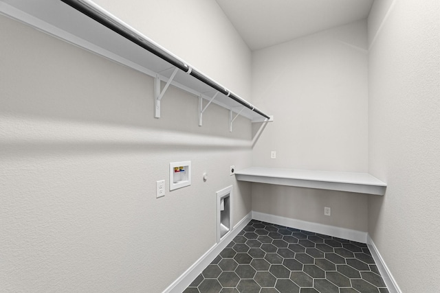 2013 Tolleson Dr, Fort Worth, TX 76008 - washroom with gas dryer hookup, hookup for a washing machine, baseboards, hookup for an electric dryer, and dark tile patterned floors