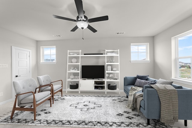 2013 Tolleson Dr, Fort Worth, TX 76008 - living area featuring ceiling fan, baseboards, and carpet floors