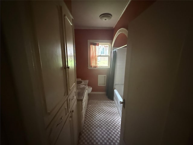 437 Jefferson St, Pittsburg, TX 75686 - bathroom featuring toilet, vanity, and bathing tub / shower combination