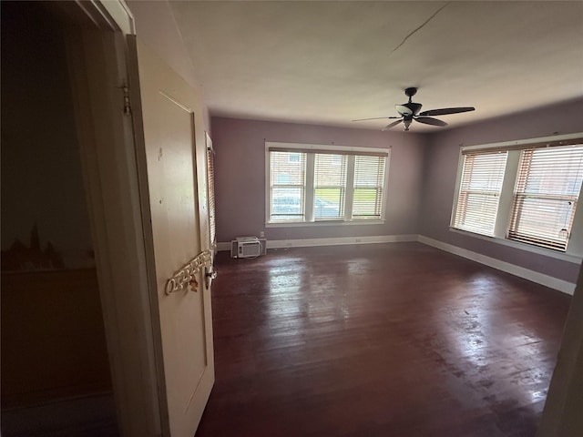 437 Jefferson St, Pittsburg, TX 75686 - unfurnished room featuring ceiling fan and baseboards