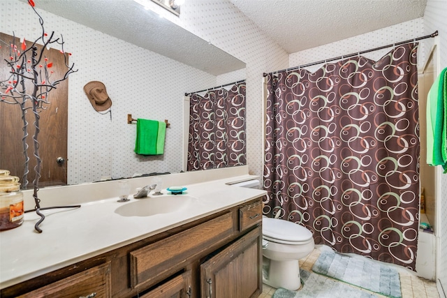 4012 Shackelford Dr, Mesquite, TX 75150 - bathroom with wallpapered walls, a textured ceiling, and vanity