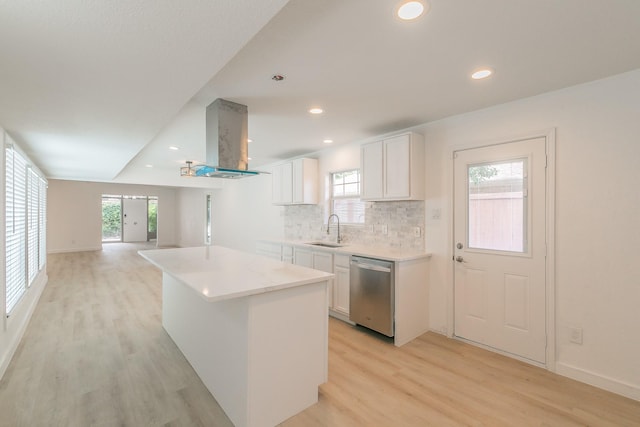 11417 Park Central Pl, Dallas, TX 75230 - kitchen with dishwasher, a sink, light wood-type flooring, white cabinetry, and recessed lighting