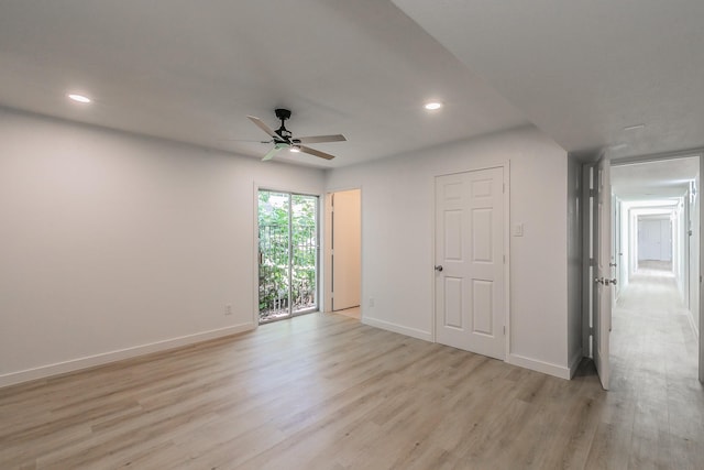 11417 Park Central Pl, Dallas, TX 75230 - spare room featuring a ceiling fan, light wood-type flooring, recessed lighting, and baseboards