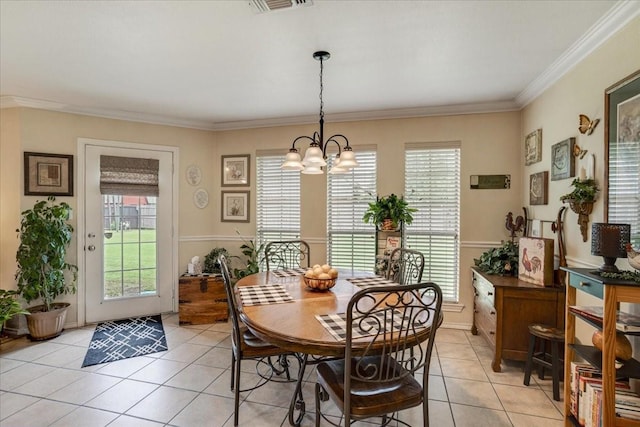 2215 Albert Broadfoot St, Bonham, TX 75418 - dining area featuring light tile patterned floors, crown molding, plenty of natural light, and a chandelier