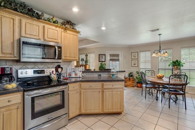 2215 Albert Broadfoot St, Bonham, TX 75418 - kitchen with appliances with stainless steel finishes, a peninsula, light brown cabinets, crown molding, and light tile patterned flooring