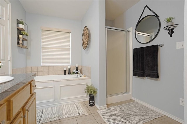 2215 Albert Broadfoot St, Bonham, TX 75418 - bathroom with a shower stall, tile patterned flooring, vanity, and a bath