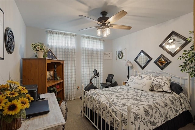 2215 Albert Broadfoot St, Bonham, TX 75418 - bedroom featuring carpet and a ceiling fan