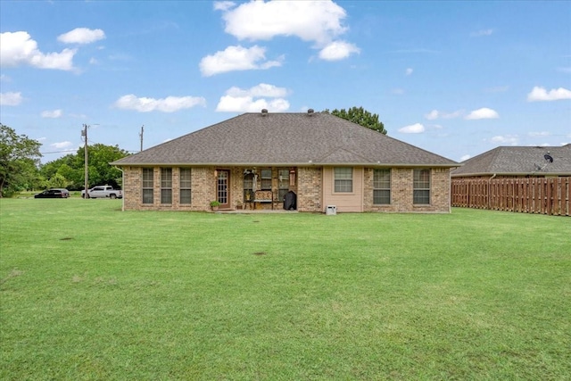 2215 Albert Broadfoot St, Bonham, TX 75418 - back of house featuring brick siding