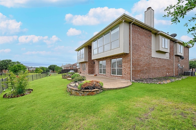 6018 San Marino Ct, Rowlett, TX 75089 - rear view of property with a patio, a chimney, brick siding, and cooling unit