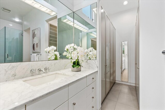 33 Vanguard Way, Dallas, TX 75243 - full bath featuring vanity, tile patterned flooring, and a shower stall