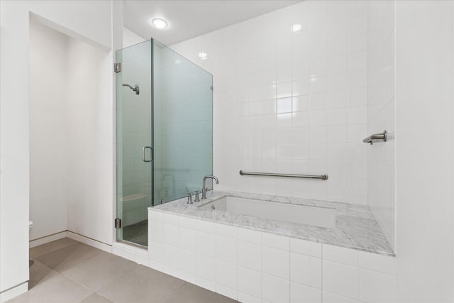 33 Vanguard Way, Dallas, TX 75243 - bathroom with tile patterned floors, a shower stall, toilet, and a garden tub