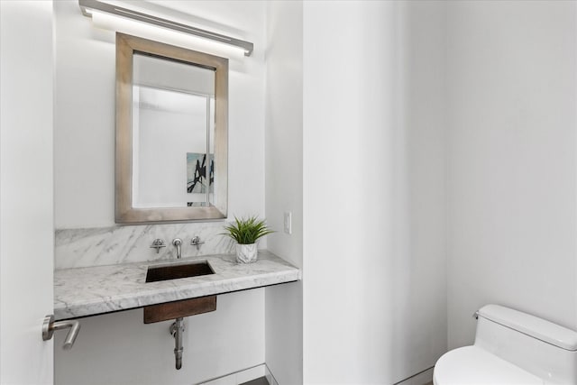 33 Vanguard Way, Dallas, TX 75243 - half bath with toilet and a sink
